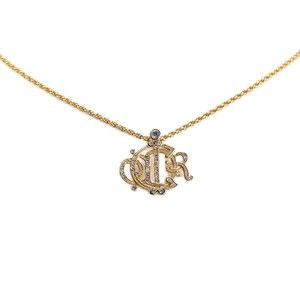 Pre-Loved Dior Gold Plated Logo Crystal Pendant Necklace